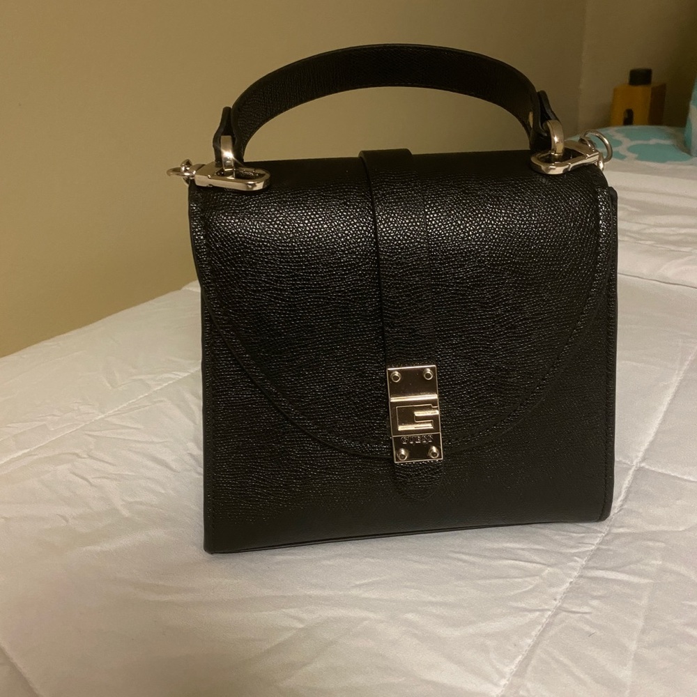 Guess hang bag , looks new and been worn once